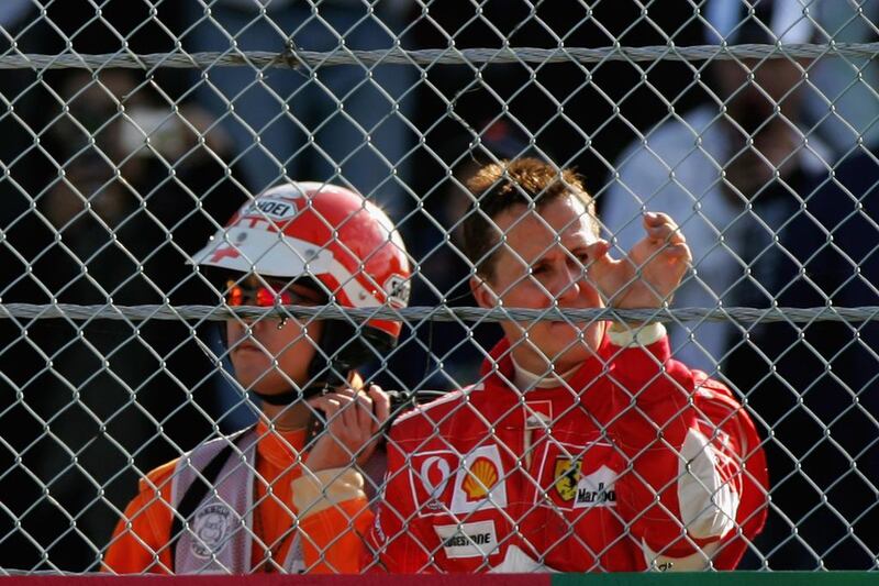 Michael Schumacher of Germany and Ferrari looks on from the side of the track after his engine failed and he retired from the race during the Japanese Formula One Grand Prix at Suzuka Circuit on October 8, 2006 in Suzuka, Japan. Paul Gilham / Getty Images