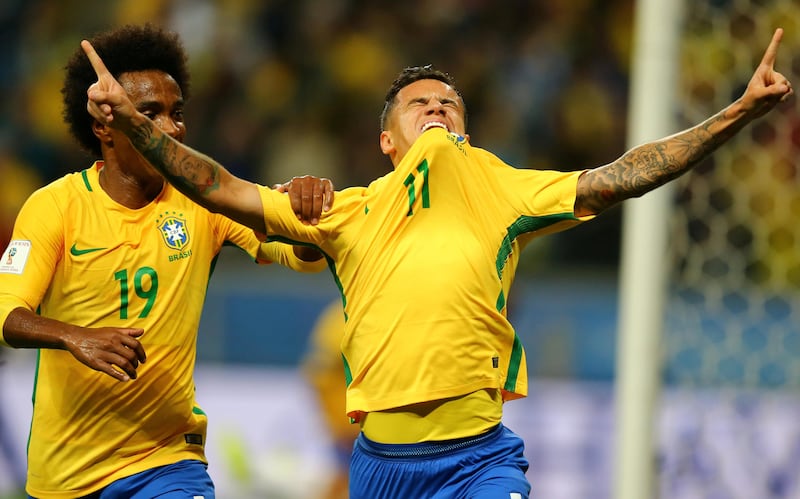 Soccer Football - 2018 World Cup Qualifiers - Brazil v Ecuador - Arena do Gremio stadium, Porto Alegre, Brazil - August 31, 2017. Philippe Coutinho (11) of Brazil celebrates his goal against Ecuador with teammate Willian. REUTERS/Pilar Olivares     TPX IMAGES OF THE DAY