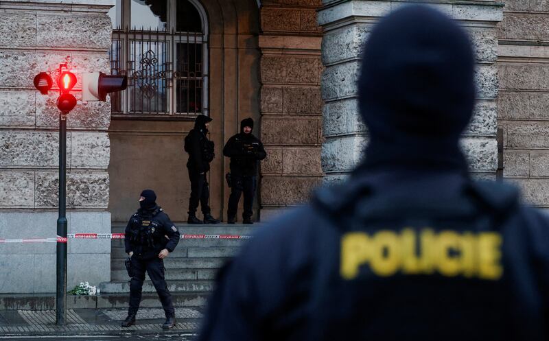 Police stand guard following a shooting at Charles University, in Prague. At least 14 people were killed in the attack. Reuters