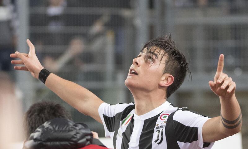 epa06577769 Paulo Dybala of Juventus jubilates after scoring the 0-1 goal during the Italian Serie A soccer match SS Lazio - Juventus FC, at Olimpico stadium in Rome, Italy, 03 March 2018.  EPA/MAURIZIO BRAMBATTI