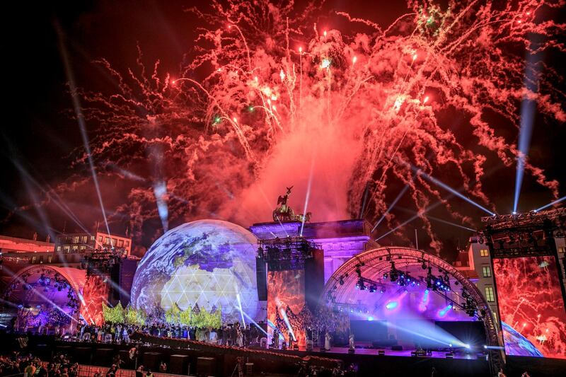 BERLIN, GERMANY - NOVEMBER 09:  Fireworks erupt over the Brandenburg Gate during celebrations on the 30th anniversary of the fall of the Berlin Wall on November 9, 2019 in Berlin, Germany. From 1961 until 1989 the Berlin Wall, built by the communist authorities of East Germany to prevent people from East Berlin fleeing into West Berlin, divided the city. Its opening in 1989 quickly led to the collapse of the East German communist government and the eventual reunification of Germany in 1991.  (Photo by Carsten Koall/Getty Images)