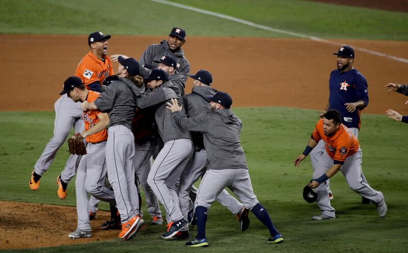 The Houston Astros celebrate their victory over the Los Angeles Dodgers in Game 7 at Dodger Stadium. The Astros won 5-1 to clinch the World Series 4-3. Jae C Hong / AP Photo