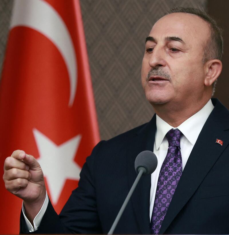 Turkish Foreign Minister Mevlut Cavusoglu speaks during a press conference following his meeting with Greek Foreign Minister, in Ankara on April 15, 2021.  / AFP / Adem ALTAN
