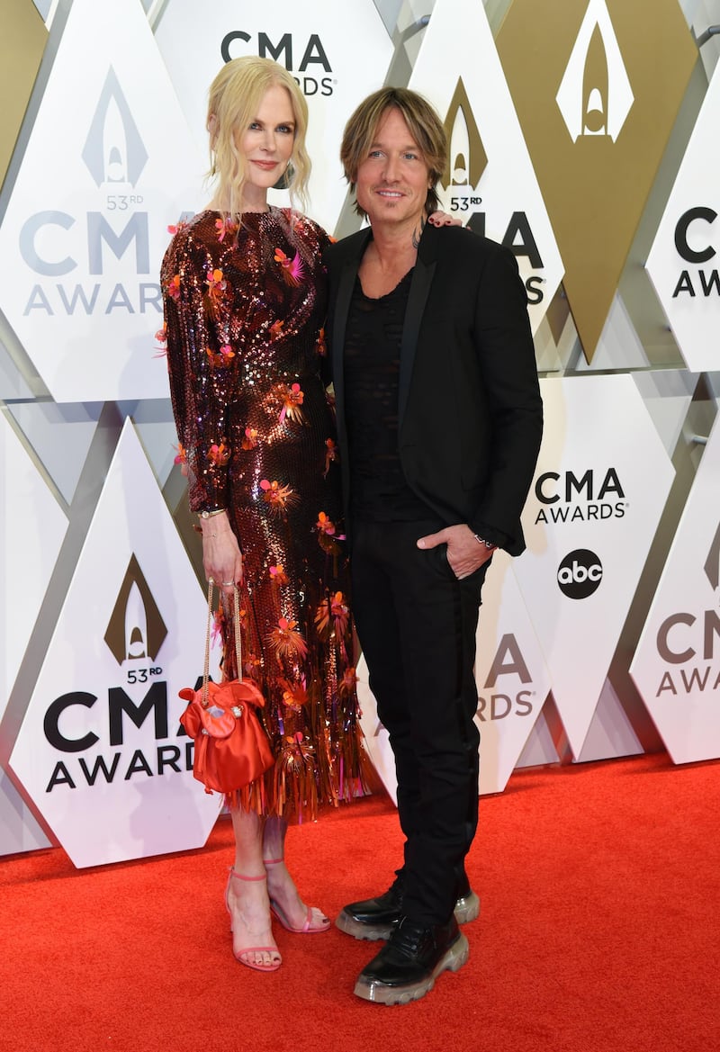 Nicole Kidman, in Versace, and Keith Urban arrive at the 53rd annual CMA Awards in Nashville on November 13, 2019. Reuters