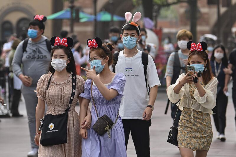 All visitors must pre-book entry to Shanghai Disneyland and capacity has been slashed. AFP