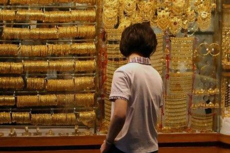 Gold prices hit record highs yesterday after hints of further policy easing from the Federal Reserve and a Moody's warning on US credit rating. Reuters