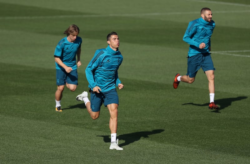 Real Madrid’s Cristiano Ronaldo, Luka Modric, and Karim Benzema are put through their paces. Sergio Perez / Reuters