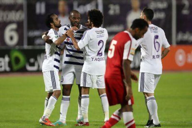 Jires Kembo Ekoko (No 9) stepped in for Al Ain in Gyan's absence.