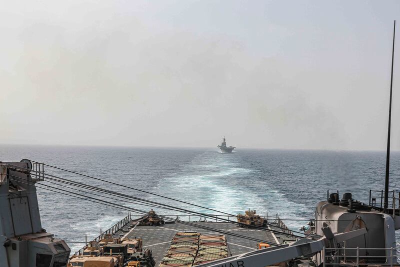 The USS Carter Hall and the USS Bataan transit Bab Al Mandeb. The US is leading a coalition stationed in the Red Sea to stop Houthi attacks on commercial shipping. AP
