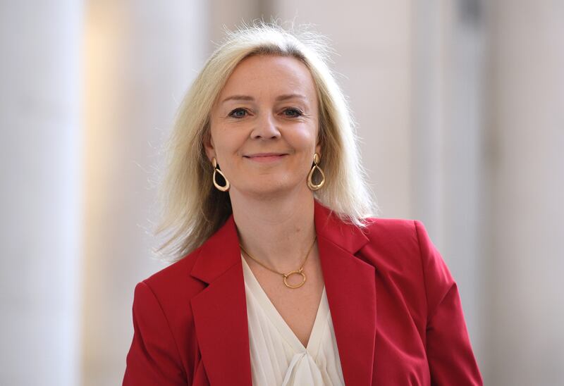 New Foreign Secretary Liz Truss has launched a strong defence of the UK's security pact with the US and Australia amid a deepening diplomatic row with France. PA