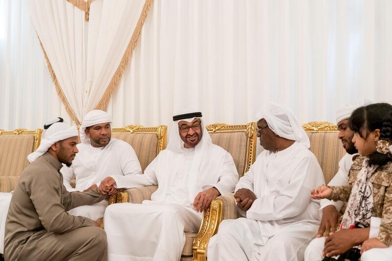 FUJAIRAH, UNITED ARAB EMIRATES - February 21, 2018: HH Sheikh Mohamed bin Zayed Al Nahyan, Crown Prince of Abu Dhabi and Deputy Supreme Commander of the UAE Armed Forces (C) offers condolences to the family of the martyr Ali Khalifa Hashel Al Mesmari, who passed away while serving the UAE Armed Forces in Yemen.

( Rashed Al Mansoori / Crown Prince Court - Abu Dhabi )
---