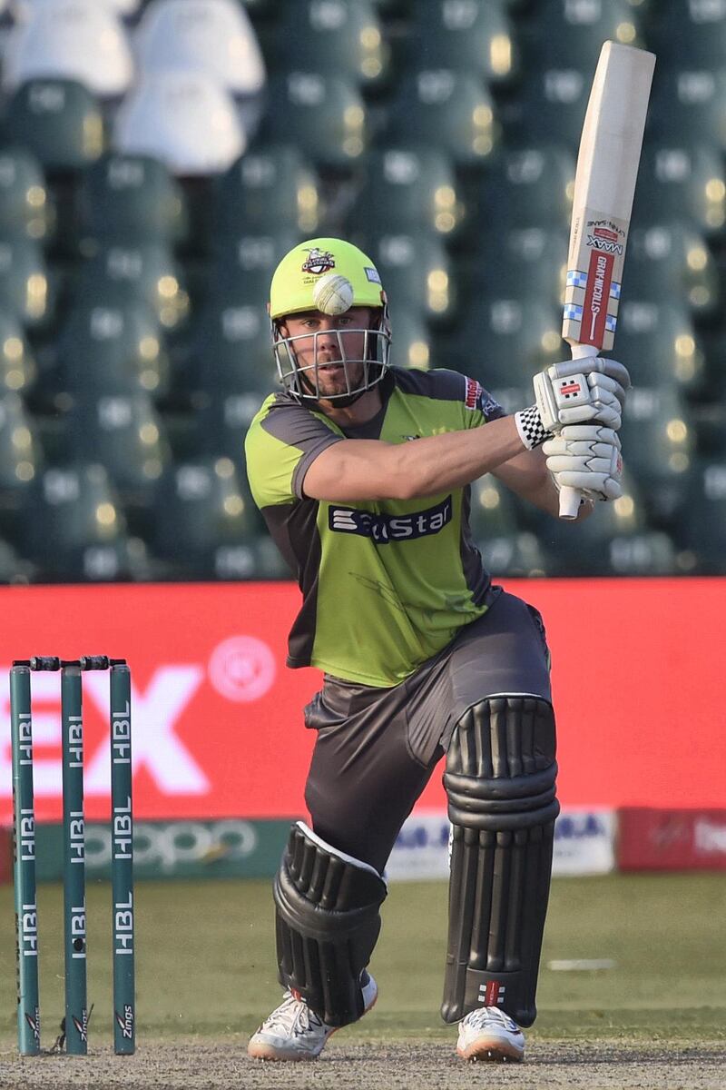 Lahore Qalandars Chris Lynn plays a shot during the Pakistan Super League (PSL) T20 cricket match between Lahore Qalandars and Multan Sultans at the Gaddafi Cricket Stadium in Lahore on March 15, 2020. (Photo by Arif ALI / AFP)