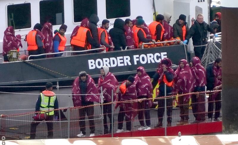 A group of people thought to be migrants are brought to Dover, Kent, by a UK Border Force vessel. Monday October 23, 2023. PA