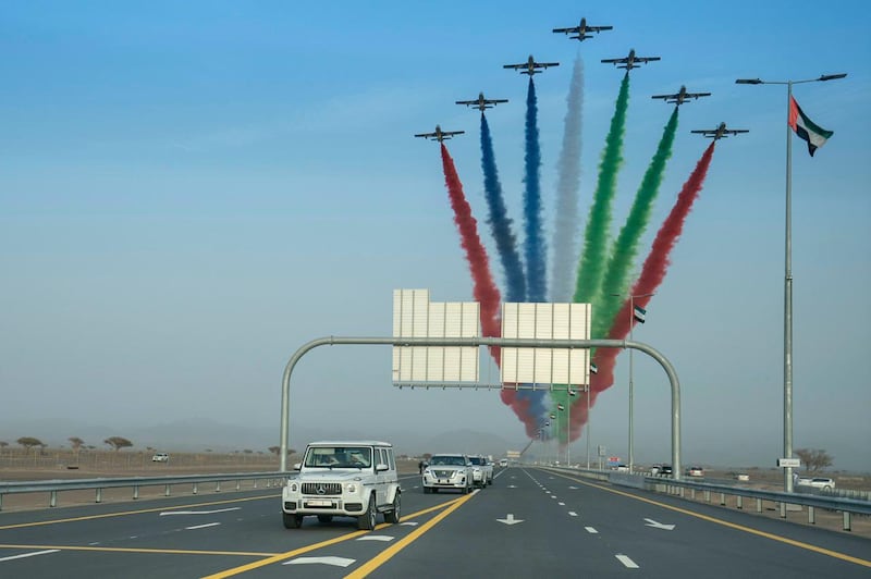 Al Fursan, the UAE Airforce’s aerobatic display team, flies overhead as Sheikh Mohammed and Sheikh Mansour tour the projects.