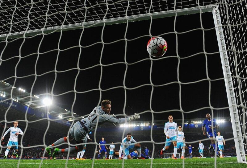 Shinji Okazaki of Leicester City scores their first goal with an overhead kick past goalkeeper Robert Elliot of Newcastle United during the Premier League match between Leicester City and Newcastle United at The King Power Stadium on March 14, 2016 in Leicester, England. (Photo by Laurence Griffiths/Getty Images)