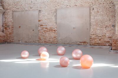 On each of these pearly spheres in pink Murano glass runs a line from a poem in Sabir, a mixed language that borrowed terms from Italian, Arabic, French and Spanish. Photo: gerdastudio