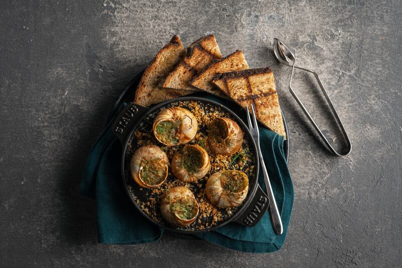 Escargot with garlic butter, parsley, chervil and lemon, Dh110