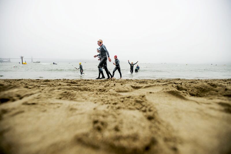 Swimmers emerge from the San Francisco Bay during the 34th annual Escape from Alcatraz Triathlon in San Francisco on Sunday. Noah Berger / Reuters / June 1, 2014