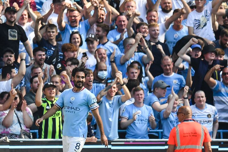 Manchester City midfielder Ilkay Gundogan celebrates after scoring the first goal in the 4-0 Premier League win against Bournemouth at the Etihad Stadium on August 13, 2022. AFP