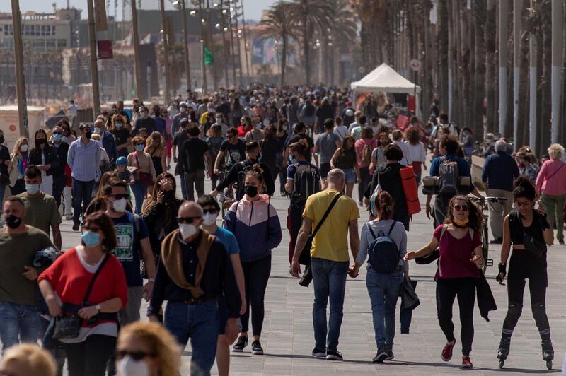 Barceloneta beach promenade is packed with people in Barcelona, Spain. EPA