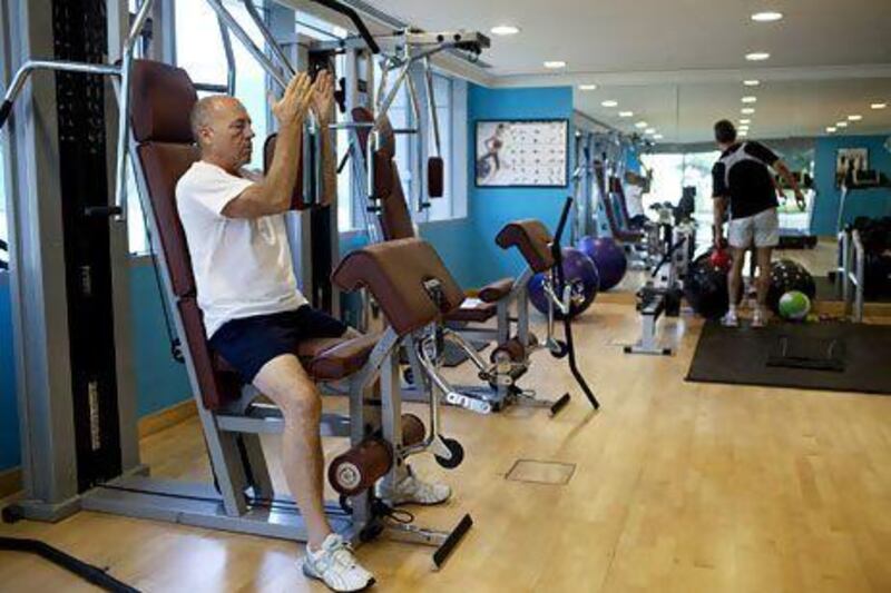German expatriate Gerd Pfeiffer, 63, at his gym at the Park Rotana Residence in Abu Dhabi. Christopher Pike / The National