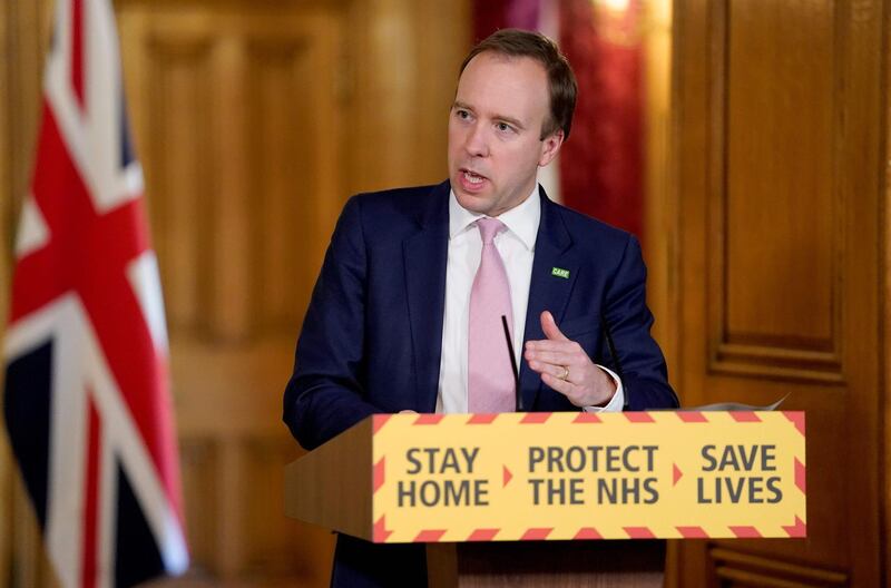 A handout image released by 10 Downing Street, shows Britain's Health Secretary Matt Hancock speaking during a remote press conference to update the nation on the Covid-19 pandemic, inside 10 Downing Street in central London on April 15, 2020. The British government was under pressure Wednesday to set out its plans to end the coronavirus lockdown, as the country's death toll approached 13,000. Figures announced by the health ministry on Wednesday showed that 12,868 people have died from the coronavirus, a rise of 761 over the previous day.
 - RESTRICTED TO EDITORIAL USE - MANDATORY CREDIT "AFP PHOTO / 10 DOWNING STREET / ANDREW PARSONS " - NO MARKETING - NO ADVERTISING CAMPAIGNS - DISTRIBUTED AS A SERVICE TO CLIENTS
 / AFP / 10 Downing Street / Andrew PARSONS / RESTRICTED TO EDITORIAL USE - MANDATORY CREDIT "AFP PHOTO / 10 DOWNING STREET / ANDREW PARSONS " - NO MARKETING - NO ADVERTISING CAMPAIGNS - DISTRIBUTED AS A SERVICE TO CLIENTS
