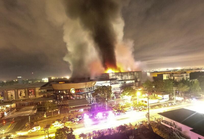 epa07925706 A drone photo of a burning mall ignited caused by a Magnitude 6.4 earthquake in General Santos city, Philippines, 16 October 2019. According to local reports, several people are injured after the magnitude 6.4 earthquake struck southern Philippines.  EPA/AJ RESANE