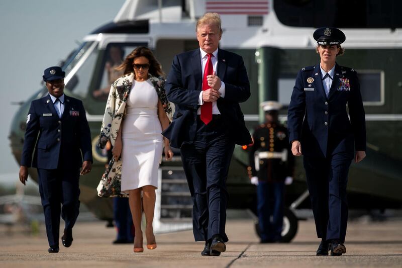 Donald and Melania Trump walk to board Air Force One as they travel to Florida for Easter weekend, at Joint Base Andrews in Maryland, US, April 18, 2019. Reuters