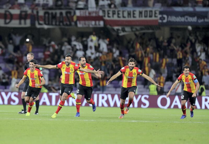 Al Ain, United Arab Emirates - December 18, 2018: Espérance celebrate winning the game between Espérance de Tunis and Guadalajara in the Fifa Club World Cup. Tuesday the 18th of December 2018 at the Hazza Bin Zayed Stadium, Al Ain. Chris Whiteoak / The National