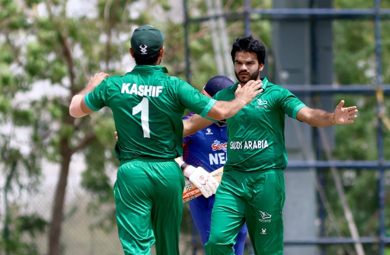 Ishtiaq Ahamad of Saudi Arabia celebrates a wicket against Nepal in their ACC Men's Premier Cup match at the Oman Cricket Stadium in Al Amerat, Muscat. All photos: Subas Humagain for The National