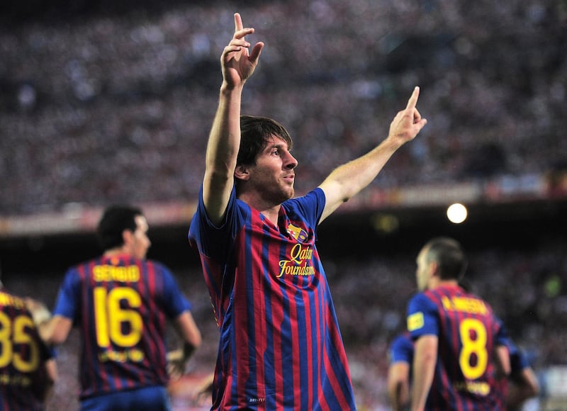 Barcelona's Argentinian forward Lionel Messi celebrates his goal during the Spanish King's Cup final match Athletic Bilbao vs FC Barcelona on May 25, 2012 at the Vicente Calderon stadium in Madrid.  AFP PHOTO / JOSEP LAGO (Photo by JOSEP LAGO / AFP)