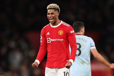 MANCHESTER, ENGLAND - JANUARY 22: Marcus Rashford of Manchester United celebrates at the full time whistle during the Premier League match between Manchester United and West Ham United at Old Trafford on January 22, 2022 in Manchester, England. (Photo by Naomi Baker / Getty Images)