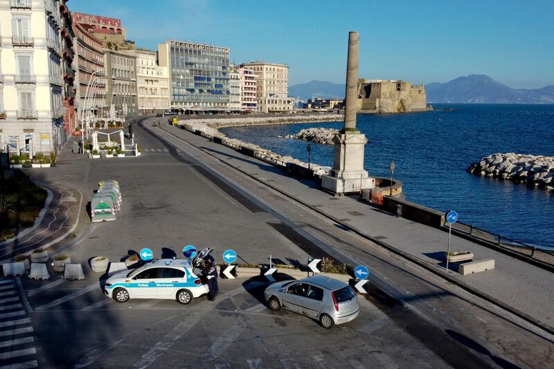 epa08367959 Local police perform checks in Seafront Caracciolo during the Coronavirus emergency in, Naples, Italy, 17 April 2020.  EPA/CIRO FUSCO