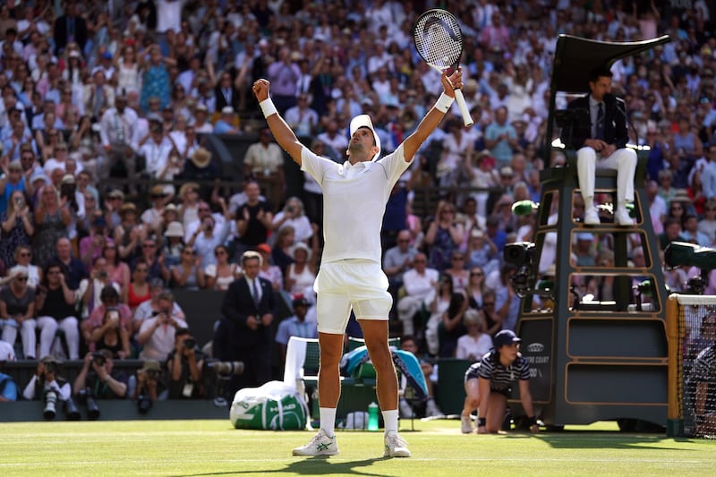 Novak Djokovic celebrates his victory over Nick Kyrgios. PA