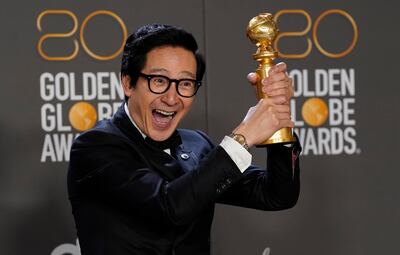 Ke Huy Quan with Golden Globe award for best performance by an actor in a supporting role in any motion picture for Everything Everywhere All at Once. AP