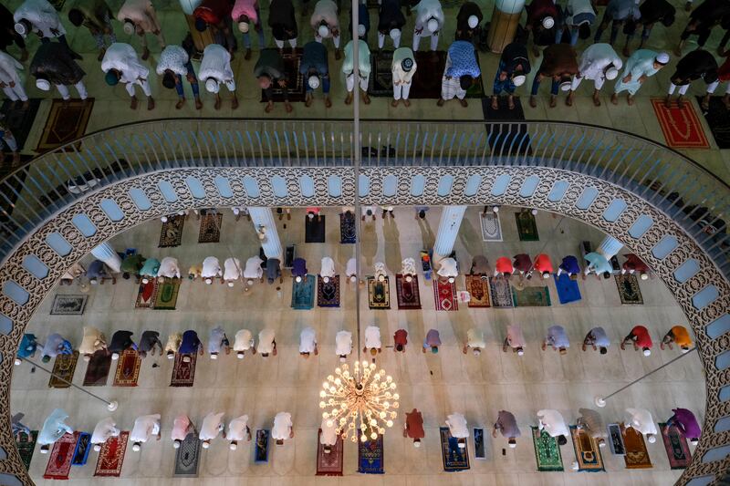 Muslims offer prayers on the morning of Eid Al Adha at Baitul Mukarram National Mosque in Dhaka, Bangladesh.