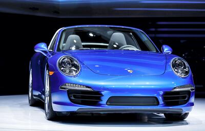 epa04019190 The new Porsche 911 Targa is introduced at the North American International Auto Show at the Cobo Center in Detroit, Michigan, USA, on 13 January 2014.  EPA/TANNEN MAURY *** Local Caption *** 51173091