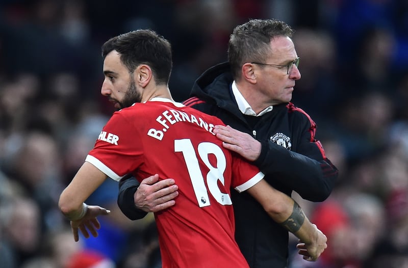 Manchester United manager Ralf Rangnick celebrates with Bruno Fernandes after the match against Crystal Palace. EPA