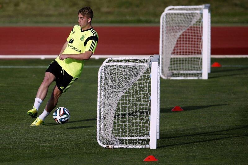 Spain's Gerard Deulofeu dribbles during a team training session in preparation for the 2014 World Cup on Monday. Sergio Perez / Reuters / May 26, 2014