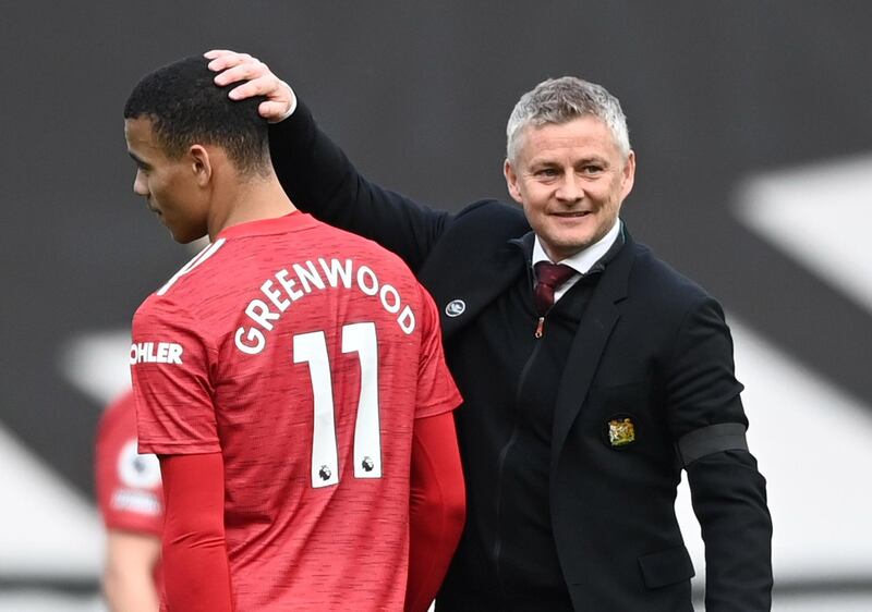United manager Ole Gunnar Solskjaer congratulates Mason Greenwood after the match. Reuters