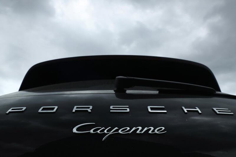 File - 18.05.2018: German authorities have found multiple software manipulations in the Porsche Cayenne and Macan and recall 60.000 cars. BERLIN, GERMANY - JUNE 13:  A Porsche Cayenne diesel SUV stands parked on June 13, 2017 in Berlin, Germany. Spiegel magazine, after conducting independent tests on a Porsche Cayenne V6 diesel SUV, is accusing the company of using software built into the car's engine to detect when it is being tested for emissions. The magazine claims the car's emissions of nitrogen-oxides are substantially higher under real driving circumstances. The accusations come in the ongoing wake of investigations into Volkswagen, Porsche's parent company, over software that illegally manipulated the emissions of VW diesel cars and affected millions of car worldwide.   (Photo by Sean Gallup/Getty Images)