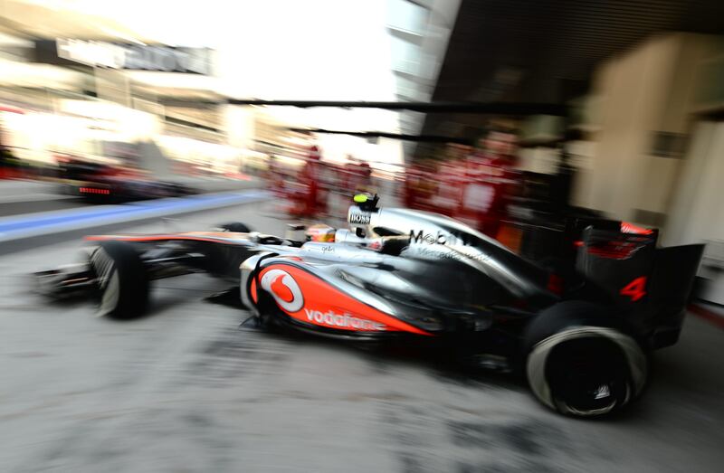 McLaren Mercedes' British driver Lewis Hamilton  leaves the pits during the first practice session at the Yas Marina circuit on November 2, 2012 in Abu Dhabi ahead of the Abu Dhabi Formula One Grand Prix. AFP PHOTO / DIMITAR DILKOFF
 *** Local Caption ***  804785-01-08.jpg