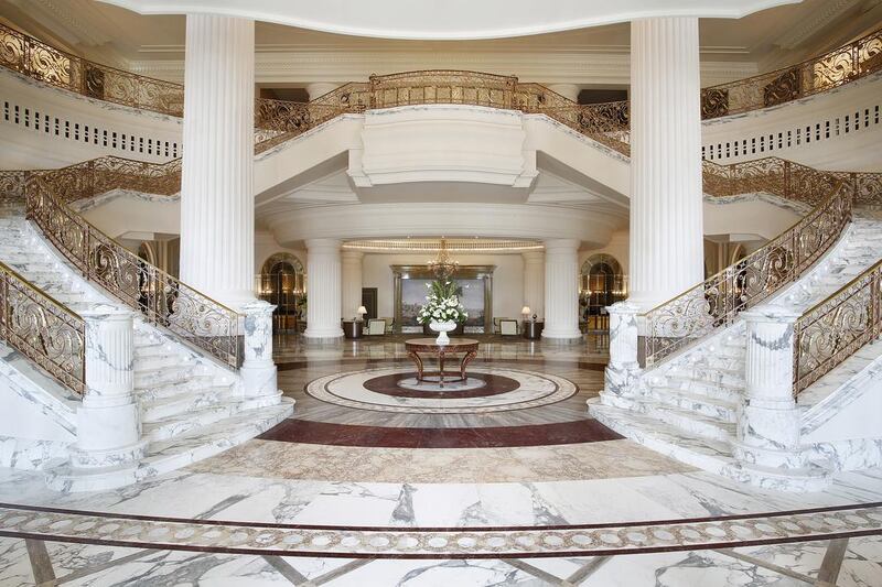 Above, the lobby and grand staircase of St Regis Dubai. Courtesy Al Habtoor Group