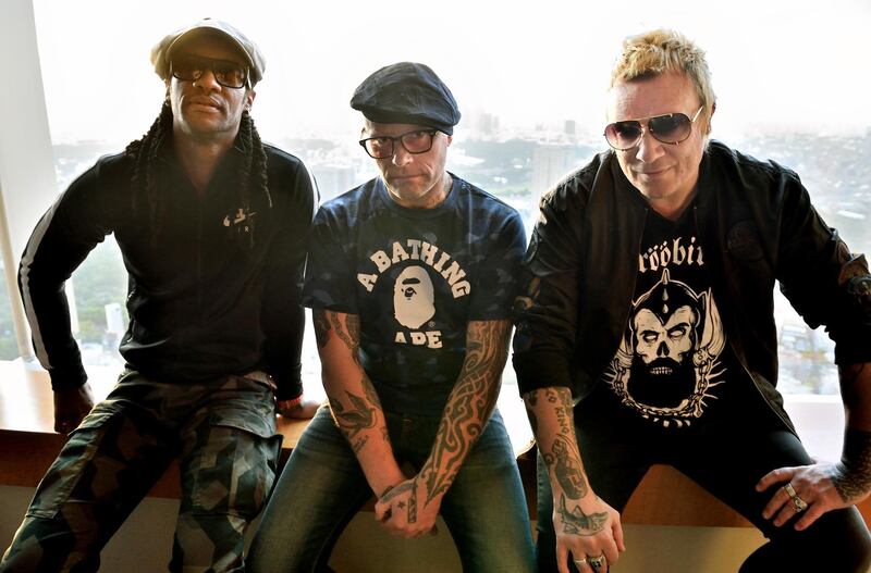 Liam Howlett (R), Keith Flint (C), and Maxim (L) in Tokyo in 2015. Photo: AFP