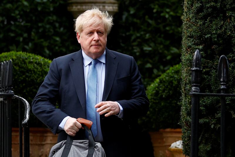 Boris Johnson outside his London home on Wednesday, hours before appearing before the Privileges Committee in parliament. Reuters