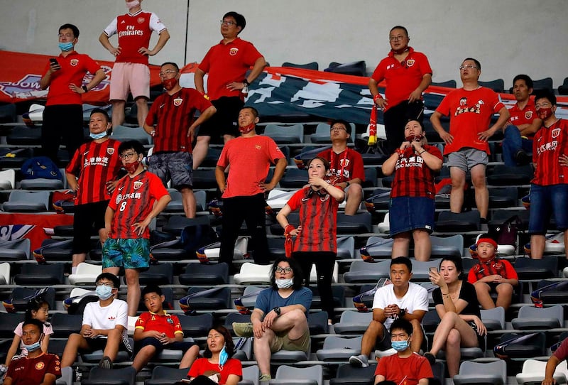 Shanghai SIPG fans watch the Chinese Super League match against Beijing Guoan in Suzhou. AFP