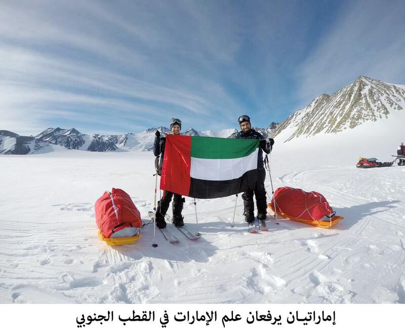 Two Emiratis, Saeed Mohammed Al Nuaimi and Amira Al Hammadi, raise the UAE flag in Antarctica, as part of a 10-day international expedition which explored renewable and alternative energy sources around the world.