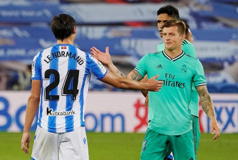 Real Madrid's Toni Kroos with Real Sociedad's Robin Le Normand after the match. Reuters
