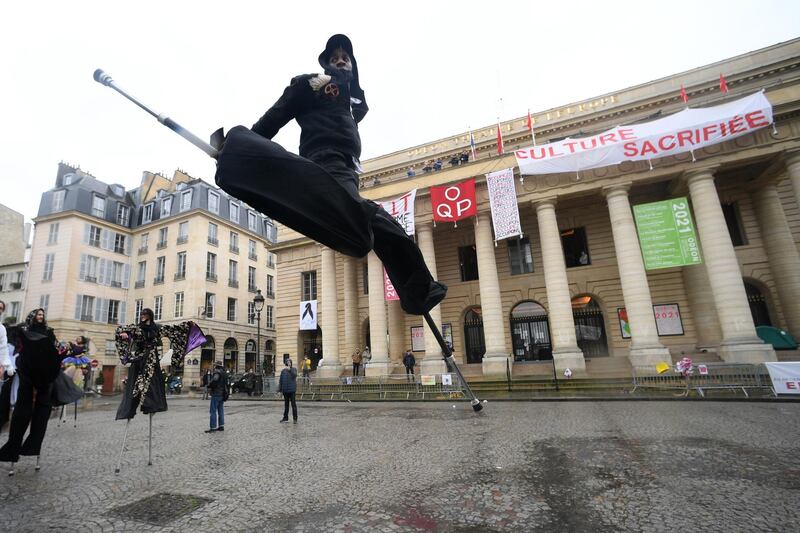 Dancers perform in front of the Theatre de l'Odeon in Paris, France. Workers have occupied the Theatre de l'Odeon since March 4 to protest against the French government's decision to close all theatres. Getty Images