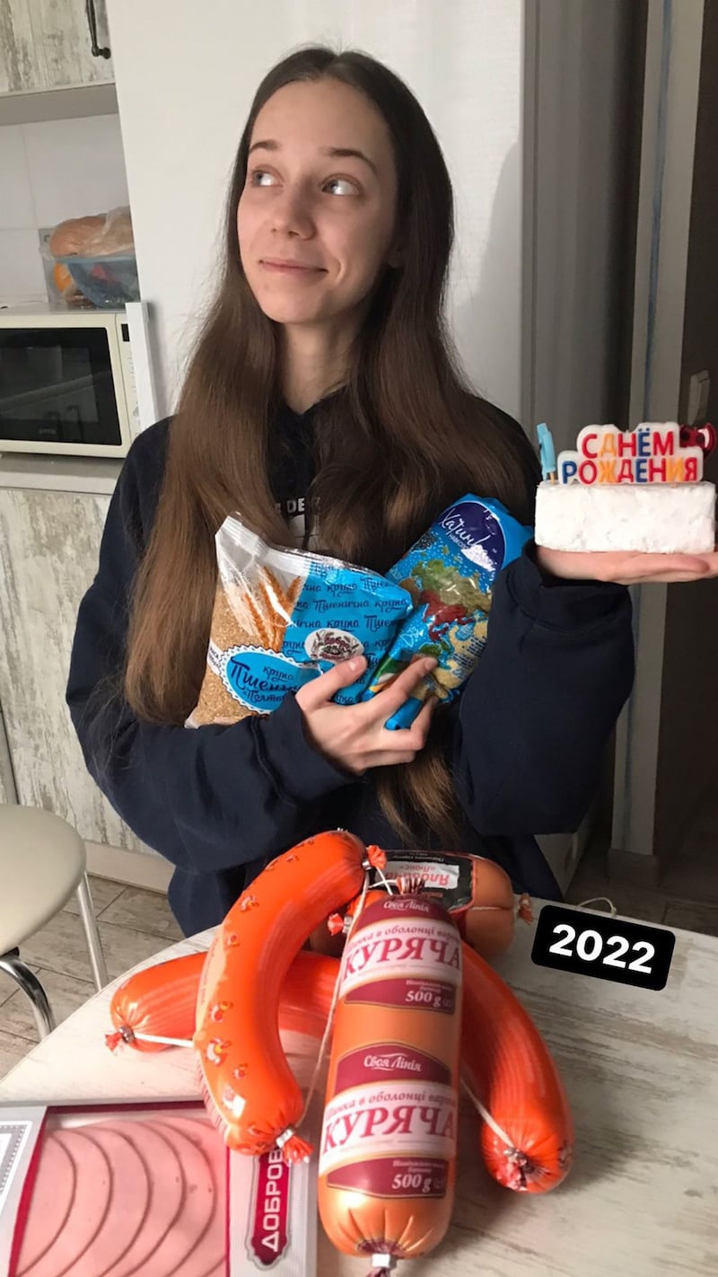 Tetiana Moroz celebrates her birthday on March 1, with cereals and sausages, as she prepares to leave Ukraine for Poland. Photo: Tetiana Moroz